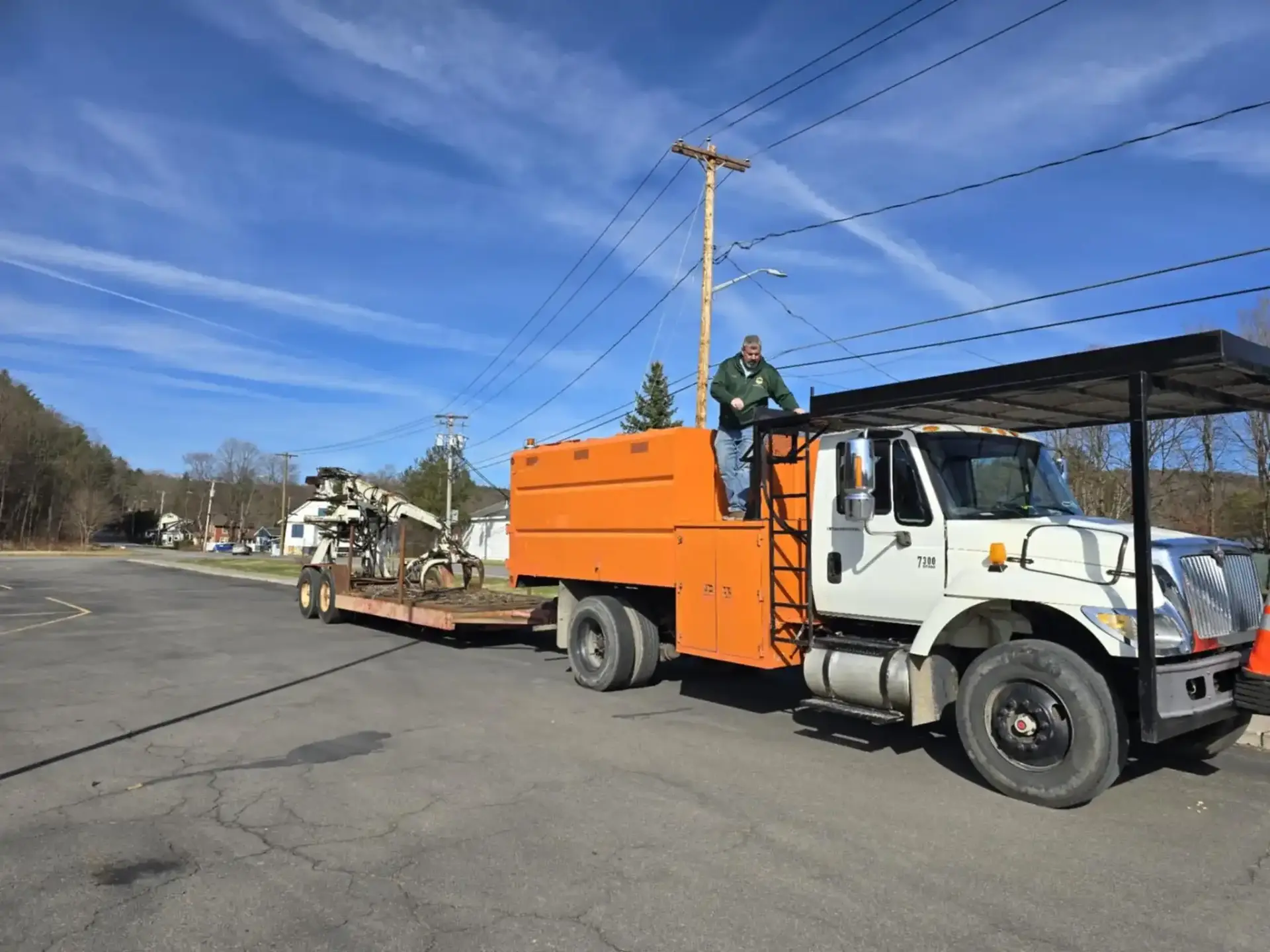 Professional tree service truck with equipment serving Kingston NY